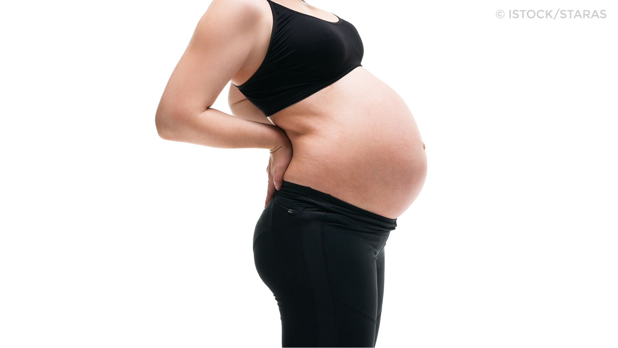 Schwangere Frau mit Rückenschmerzen